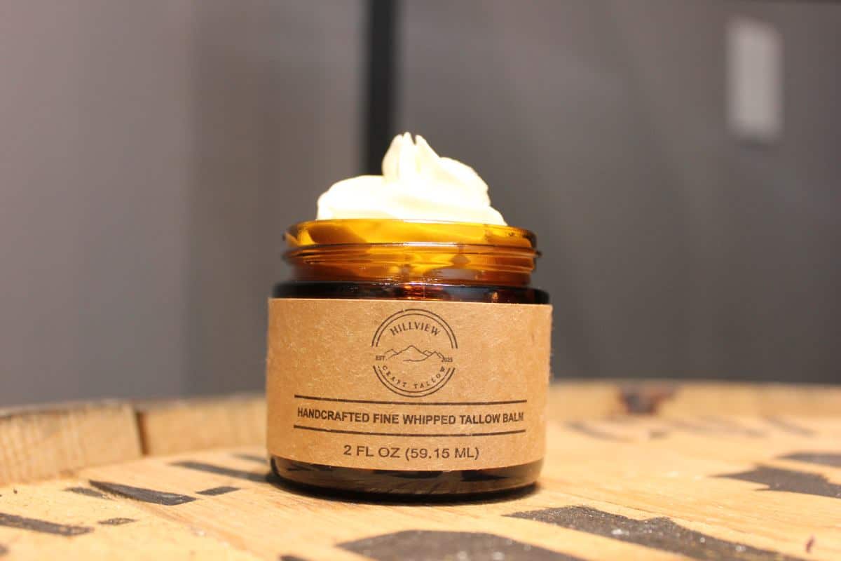2 ounce jar of hillview tallow balm lid off